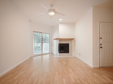 Unfurnished living room featuring light wood-styl