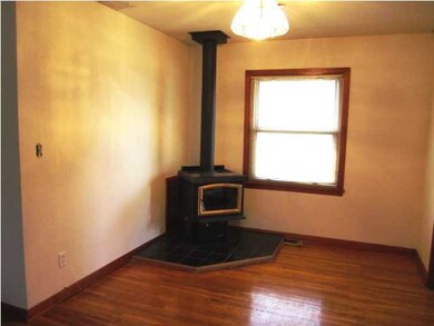 Formal dining area with wood burning stove
