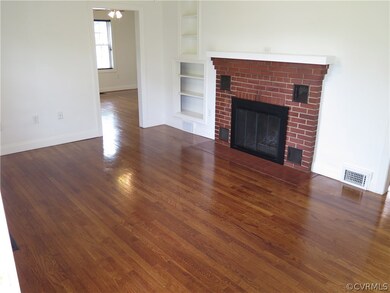 Your living room comes with Natural light, Wood fl