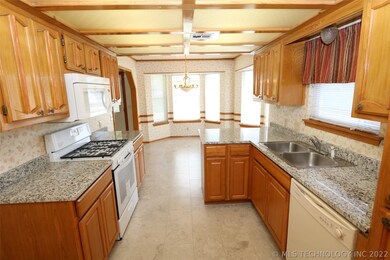 Kitchen with new granite and new tile