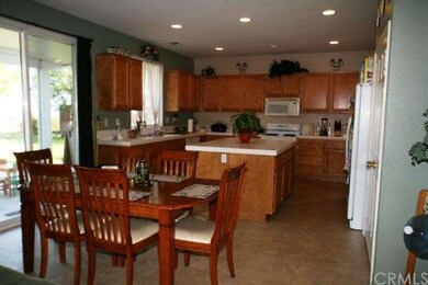 Large Kitchen with Island and double door pantry