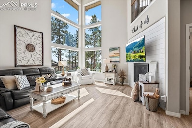 2-Story Living Room, Fireplace, Ceiling fan, Picture windows