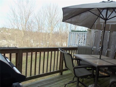 REAR DECK IS LOCATED OFF THE LIVING ROOM