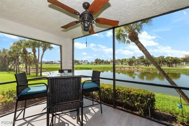 Sunroom featuring ceiling fan, a water view, and outdoor dining space