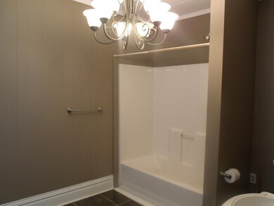 Full Bath. 1st Floor Full Bathroom offers tub with