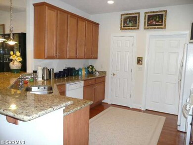Kitchen - Kitchen with Hardwood Floors and Pantry