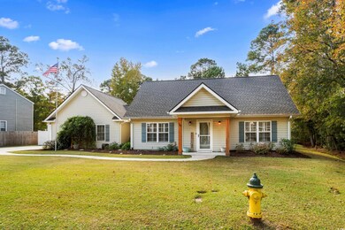 View of front of property featuring a front lawn
