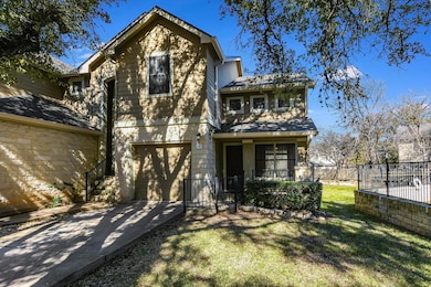 View of front of property with an attached garage and driveway