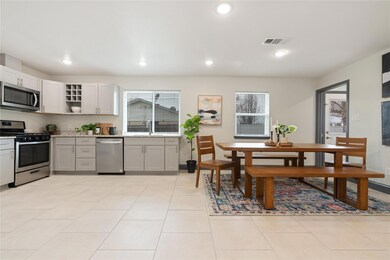 Open and bright kitchen and dining area.