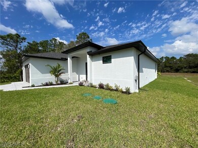 View of front of property featuring stucco siding,
