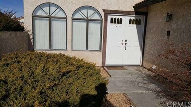 Front courtyard with double door entry