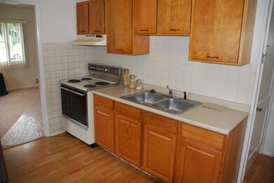 Kitchen: laminate flooring, large sink w/ garbage disposal!