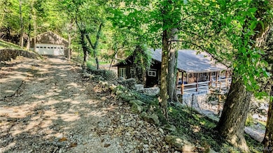 PRIVACY with a beautiful 1.7 acres and an abundanc