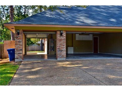 Facade/Exterior Front. Far left garage door has a 