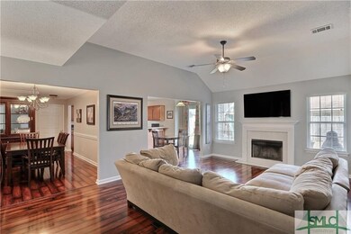 Great room looking into formal dining room