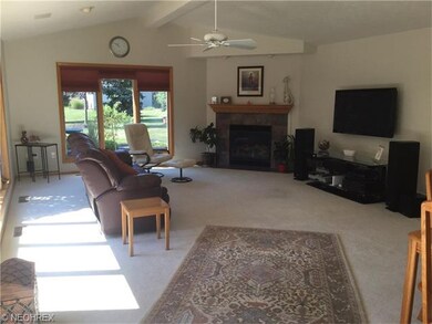 Large Great Room with gas fireplace and windows ga