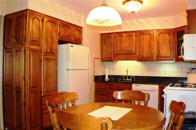 Updated kitchen with more than ample storage, gran
