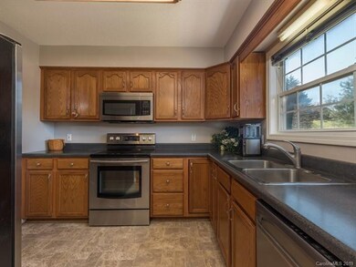 Kitchen features stainless steel appliances
