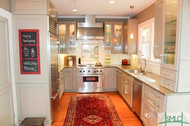 Gorgeous kitchen with stainless steel appliances.