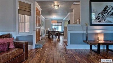 VIEW FROM THE FAMILY ROOM LOOKING TOWARDS DINING A
