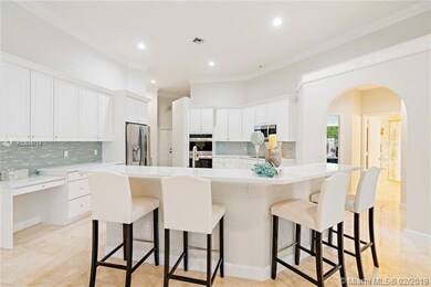 New kitchen with quartz counter tops, breakfast ba