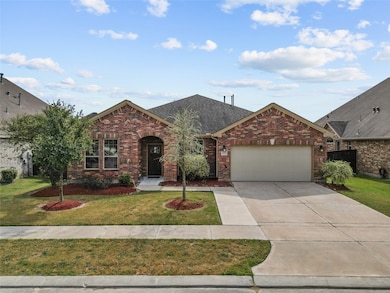 This is a TWO story brick home with an arched entr
