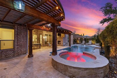 The back yard features a pool/spa and Outdoor Livi
