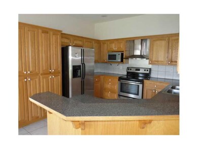 Kitchen. The appliances are stainless steel and the refrigerator conveys. Plenty of cabinet space as well.