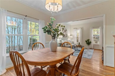 Dining area with light hardwood / wood-style floor