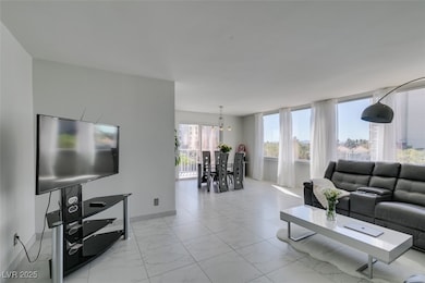 Living area with marble finish floor, baseboards,