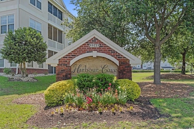 Community sign featuring a yard
