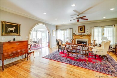 Large room with kitchen to the left. Glassed doors
