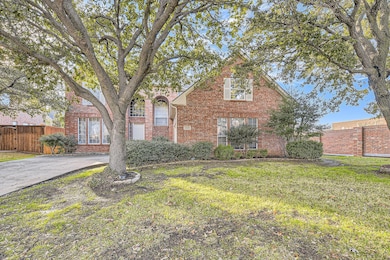 Front facade with a front lawn