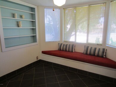 Dining nook with Bay Window and shelves