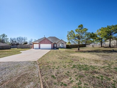 View of front of home featuring a front lawn and a