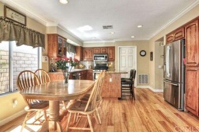 Distressed hickory hardwood floors throughout the 