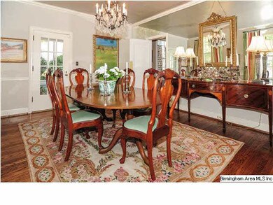 Dining room with mirrored wall