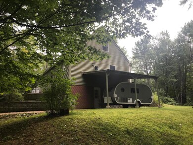Right Side of House with Car Port