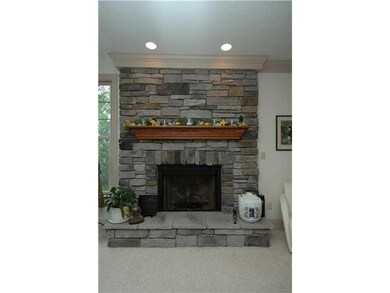 Great Room. Dramatic Great Room with stone firepla