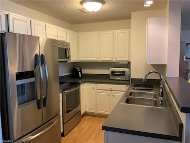 Kitchen with stainless steel appliances