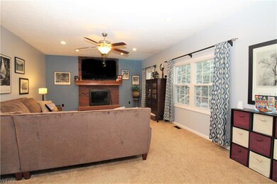 Family Room Brightened by Wall of Windows