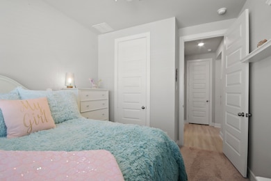 Spare bedroom has a full bathroom off the hallway.