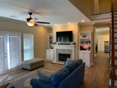 NOW THIS IS A HUGE GREATROOM WITH FRENCH DOORS THA