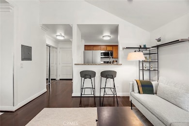 View of kitchen and front door foyer.