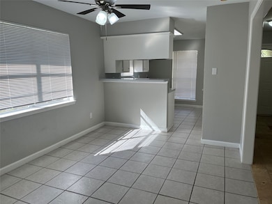 Breakfast area leading to the kitchen