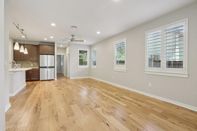 Unfurnished living room with light wood finished 