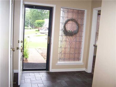 Front door with beautiful leaded glass window and 