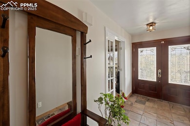 The main level offers flexible space for work or r