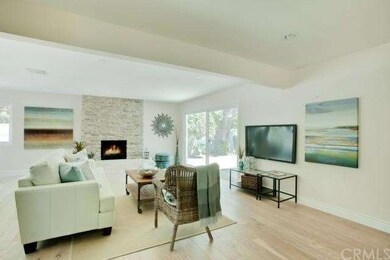 Wide open floor plan with fire for ambiance.