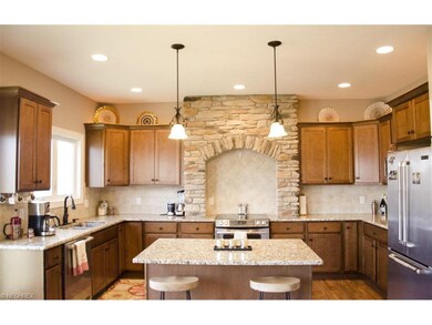 Incredible kitchen with a mix of stone, hardwood a